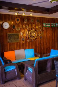 Club lounge with nautical decorations and seating