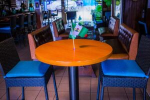 Round table and chairs inside the Club
