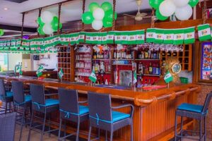 Bar counter decorated with Nigerian flags